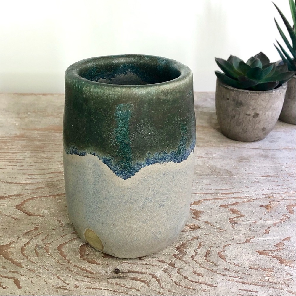 Handmade pottery cup with thick drip glaze